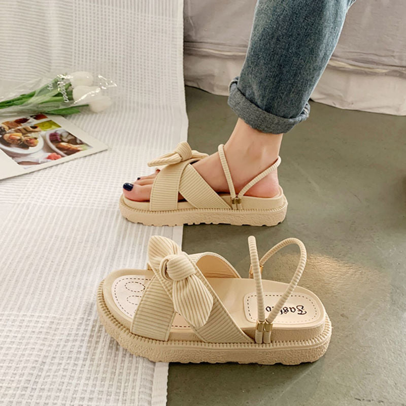 Eleganti sandali con fiocco e suola platform da donna